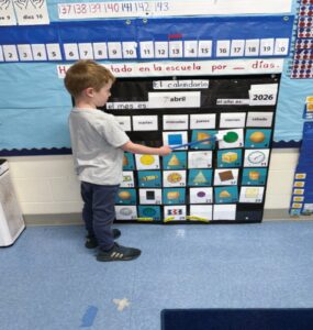 Jake Wiseman demonstrates the math calendar routine in his Spanish Immersion kindergarten class. (Photo courtesy Liliana Smith)