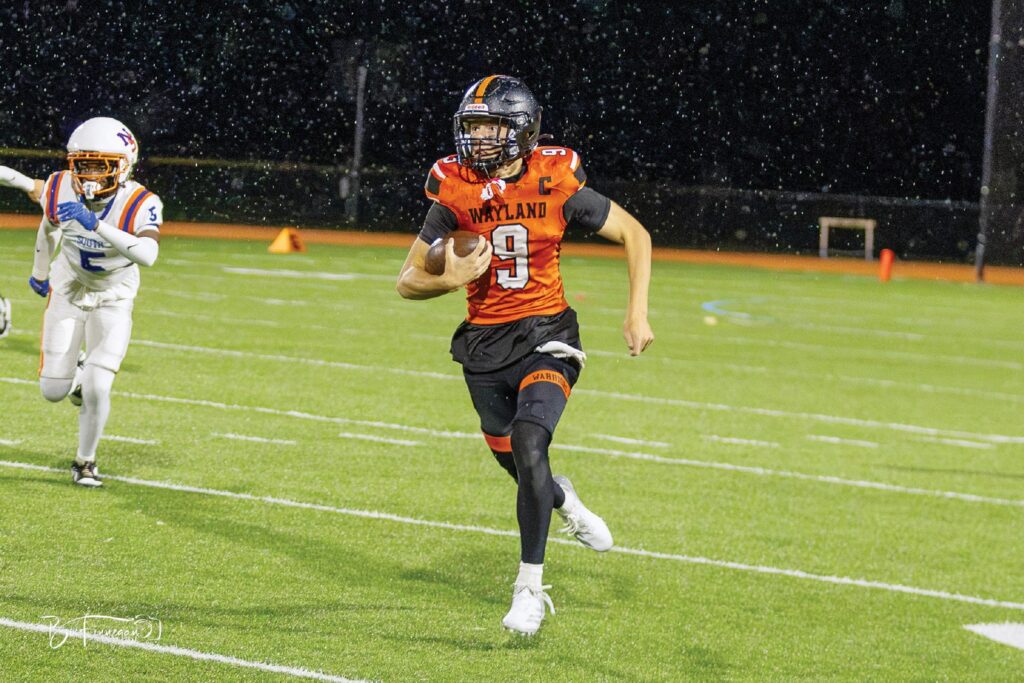 Senior quarterback Mikey Johansson has led the undefeated Warriors with his throwing and running. (Photo by Bo Finnegan)
