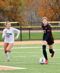 Senior Sazie Wrentmore, the team’s leading scorer, looks to pass against Grafton. Photo by Brad Spiegel